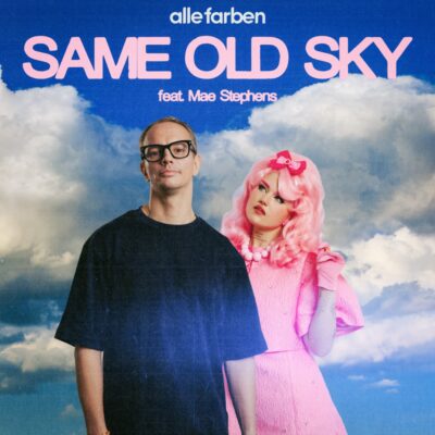 Album cover for 'Same Old Sky' featuring a man in a black T-shirt beside a pink-haired artist against a cloudy blue sky background.