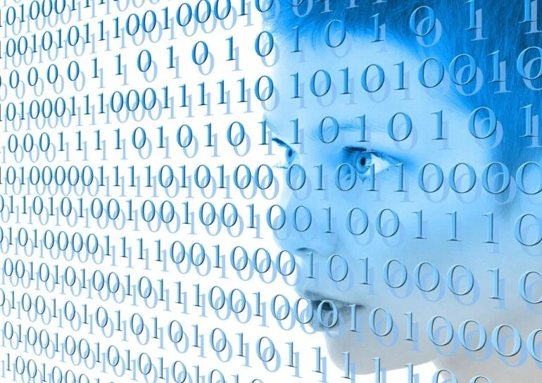 Profile of a woman's face overlaid with blue binary code (0s and 1s) representing digital data and privacy.