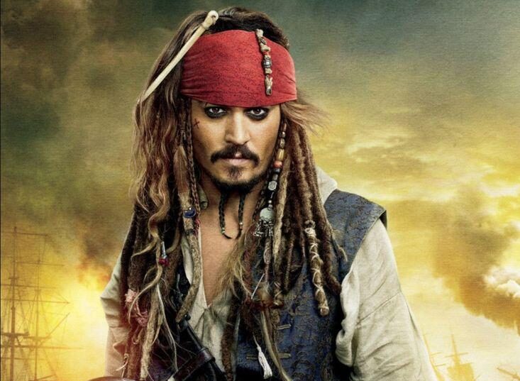 Captain Jack Sparrow in a red bandana and pirate outfit, standing in a smoky harbor with ships in the background