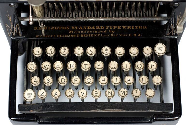 Close-up of a vintage Underwood standard typewriter keyboard with ivory round keys.