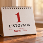 Calendar on a wooden table showing November 1, a Sunday (1 LISTOPADA NIEDZIELA) with a red numeral 1 and black text.